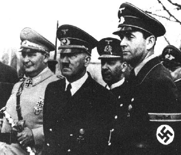 Hermann Gring, Adolf Hitler, Albert Speer (wearing Swastika)